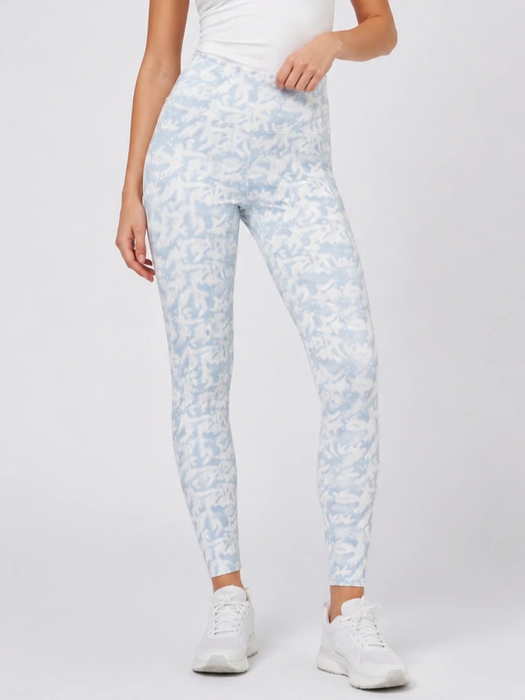 Model wearing light blue abstract print high-rise leggings