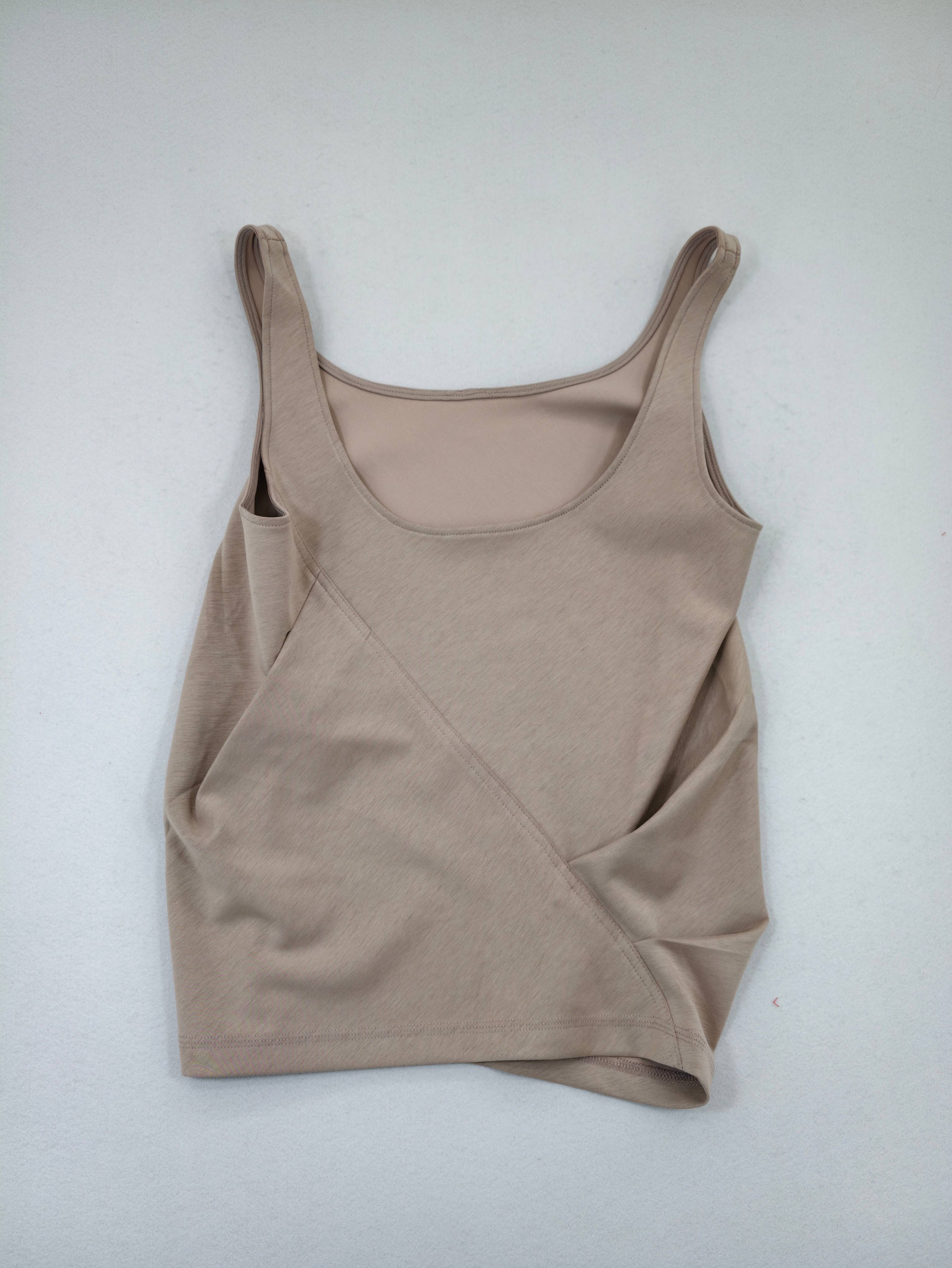 Taupe scoop-neck stretch tank top laid flat from front