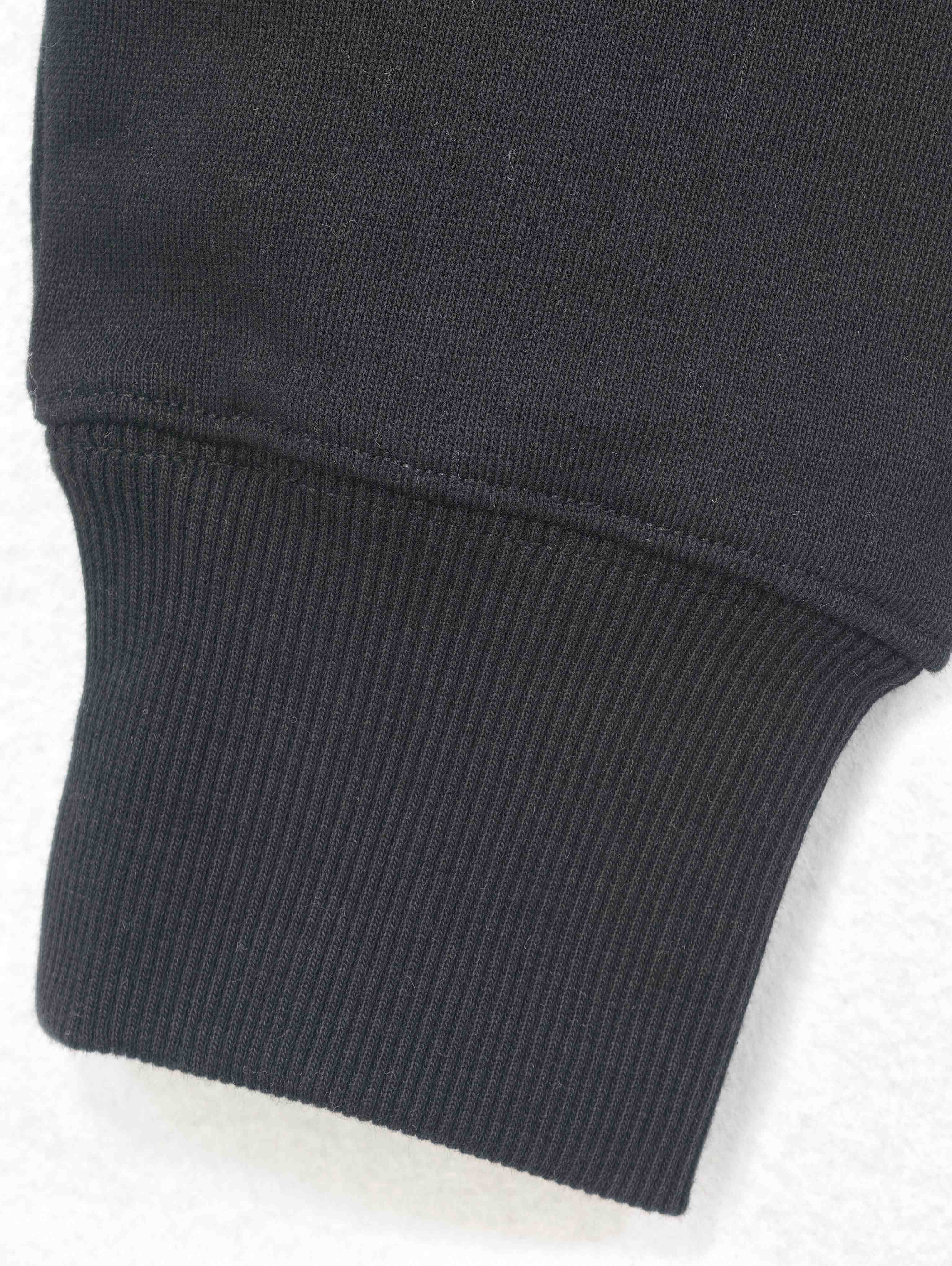 Ribbed cuff and sleeve finishing construction close-up