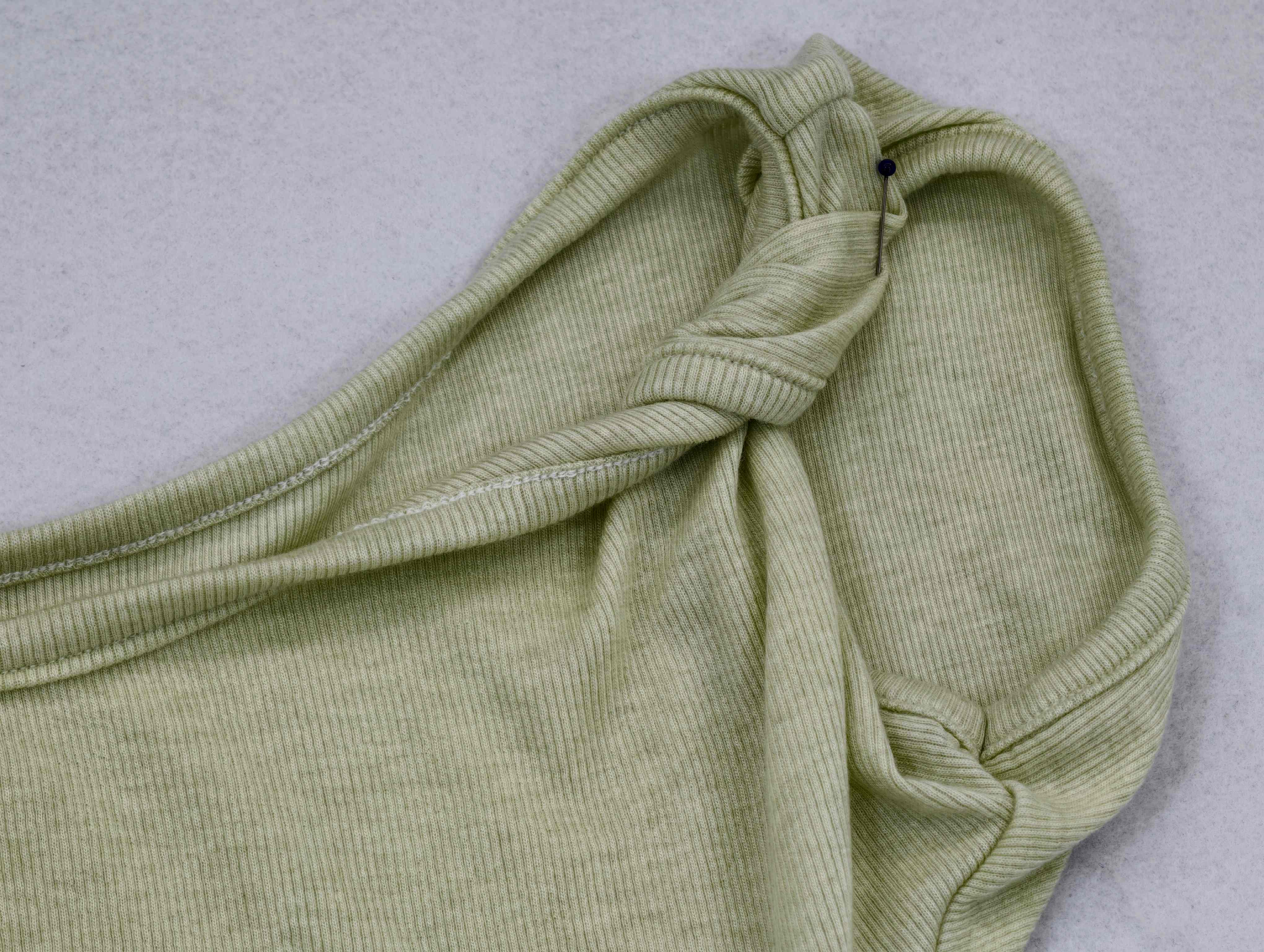 Knotted shoulder construction on soft Lyocell-wool rib fabric