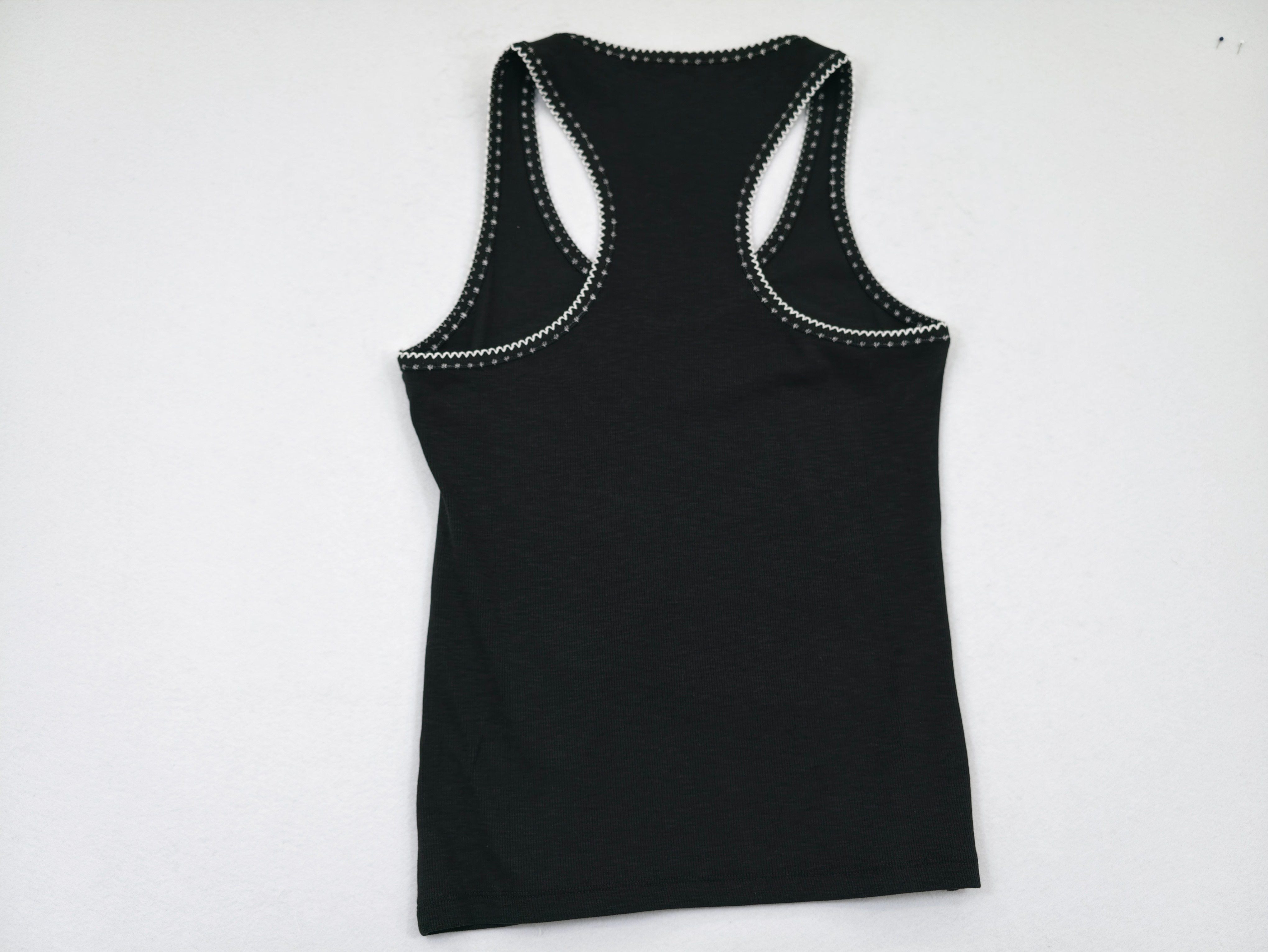 Racerback view of fitted cotton-rayon stretch tank