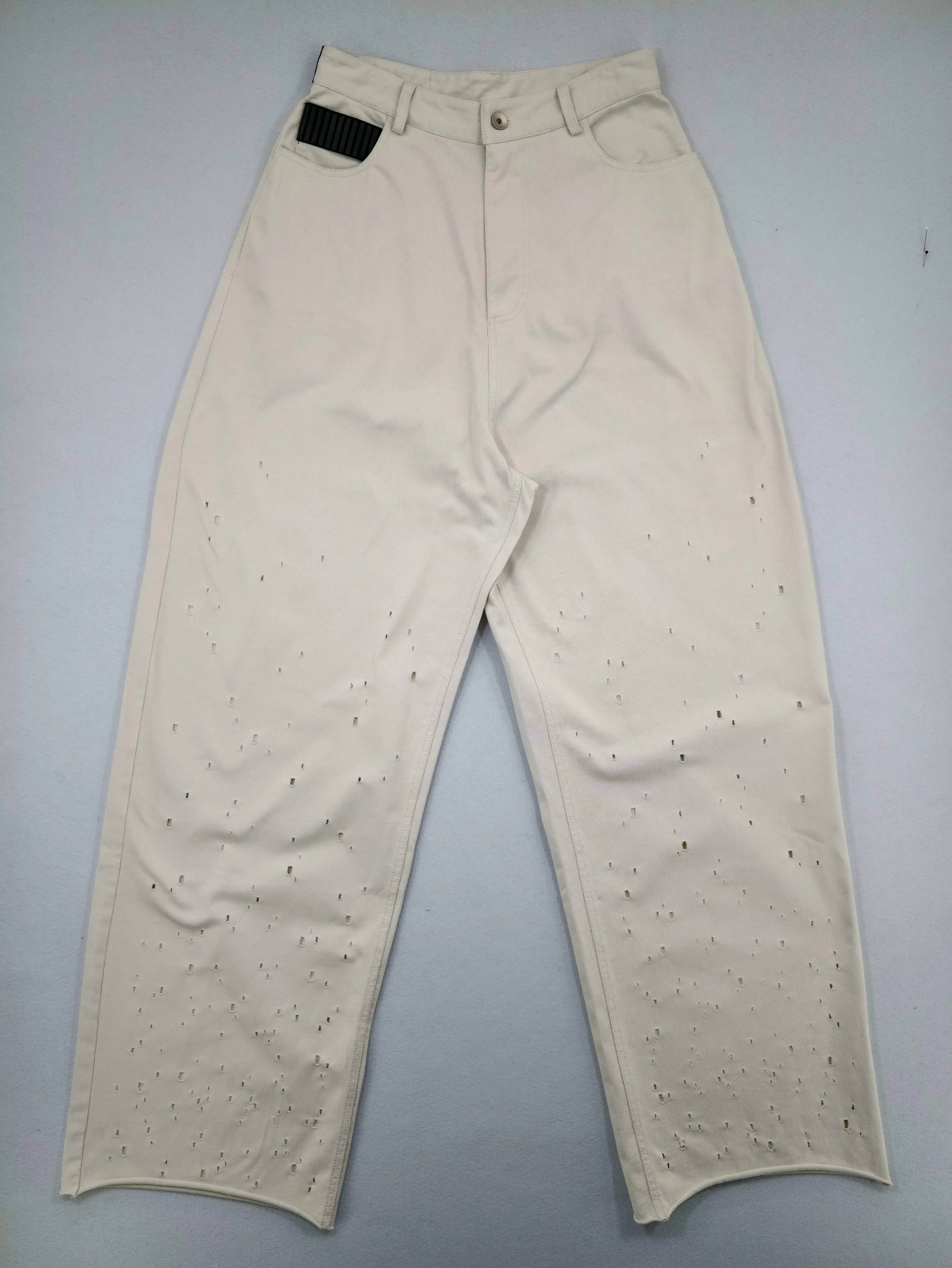 Perforated cotton jersey pants front flat view