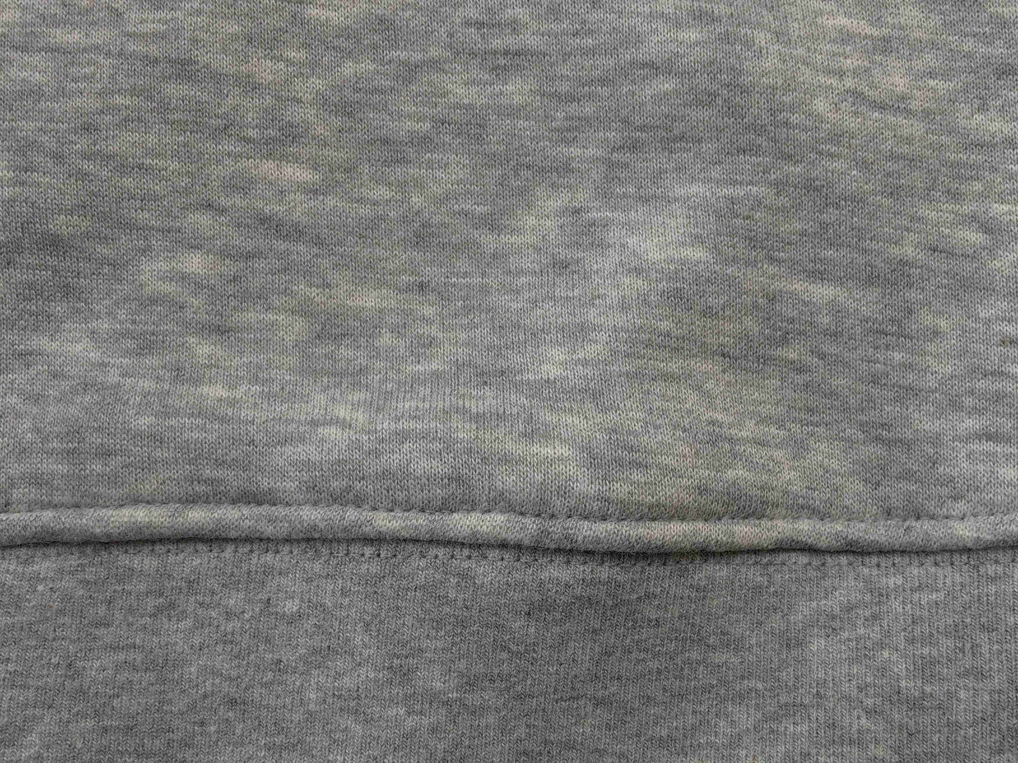 Cotton-blend sweatshirt fabric and seam finishing close-up