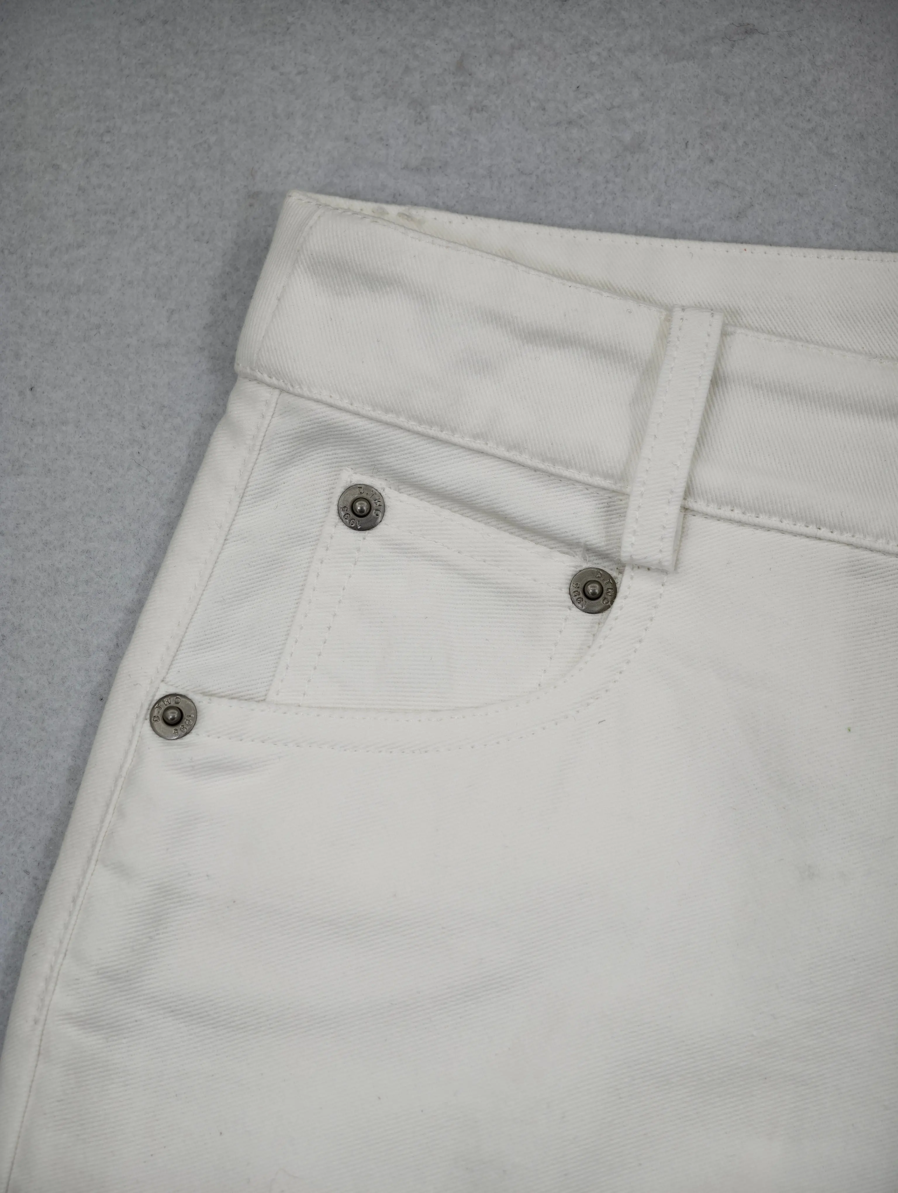 Scalloped hem eyelet detail on custom cotton pants