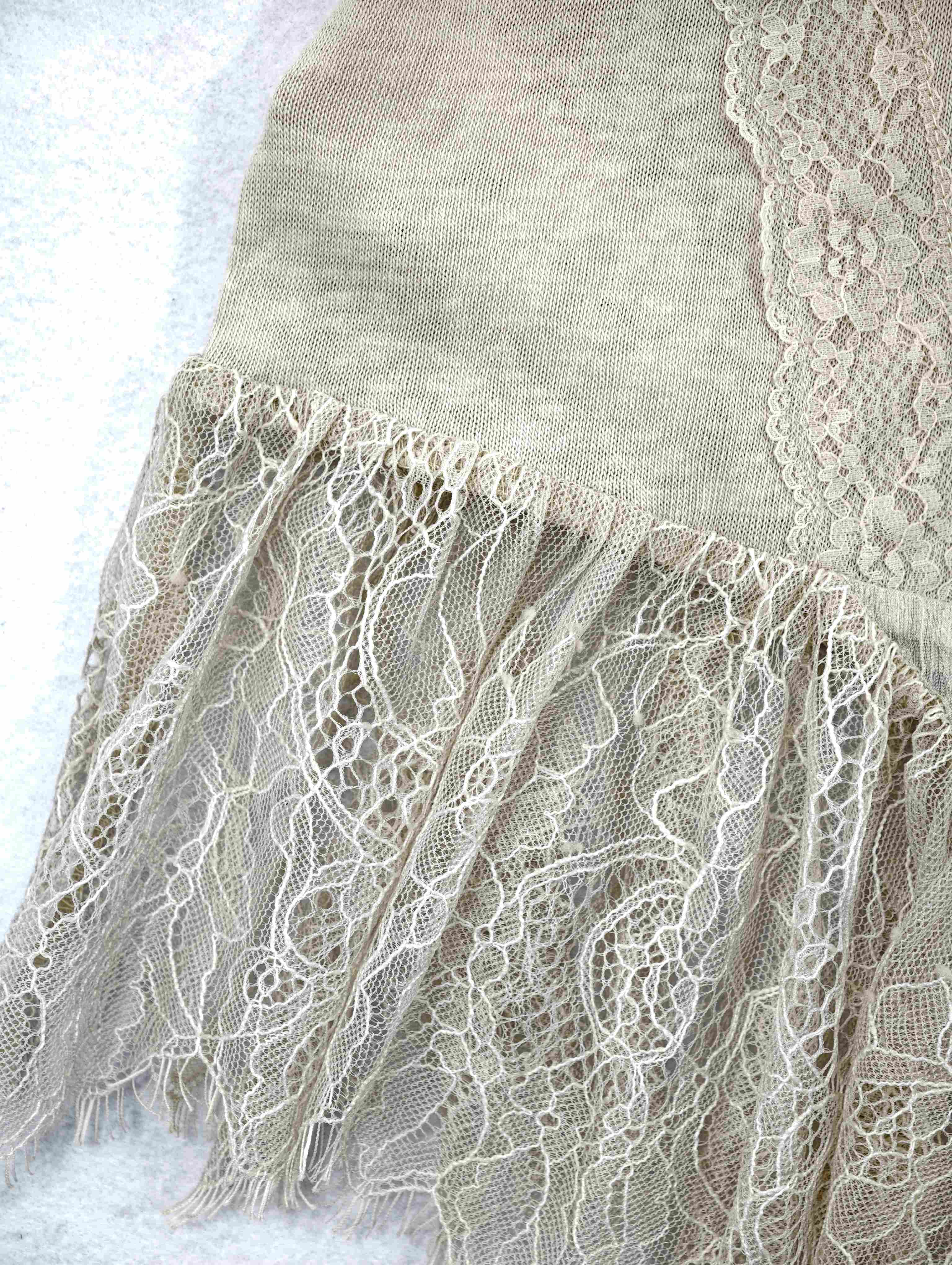 Asymmetric sheer panel with eyelash lace