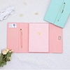 Avec poches pour cartes et porte-stylos