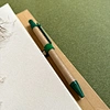 Spiralnotizbuch mit Stift
