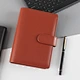 Planificateur à feuilles mobiles avec fermeture à pression