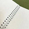 Spiralnotizbuch mit Stift