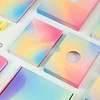 Mit individuell bedruckten Notizbuch-Geschenksets von Slide Box