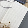 Journal d'affaires avec boucle en métal