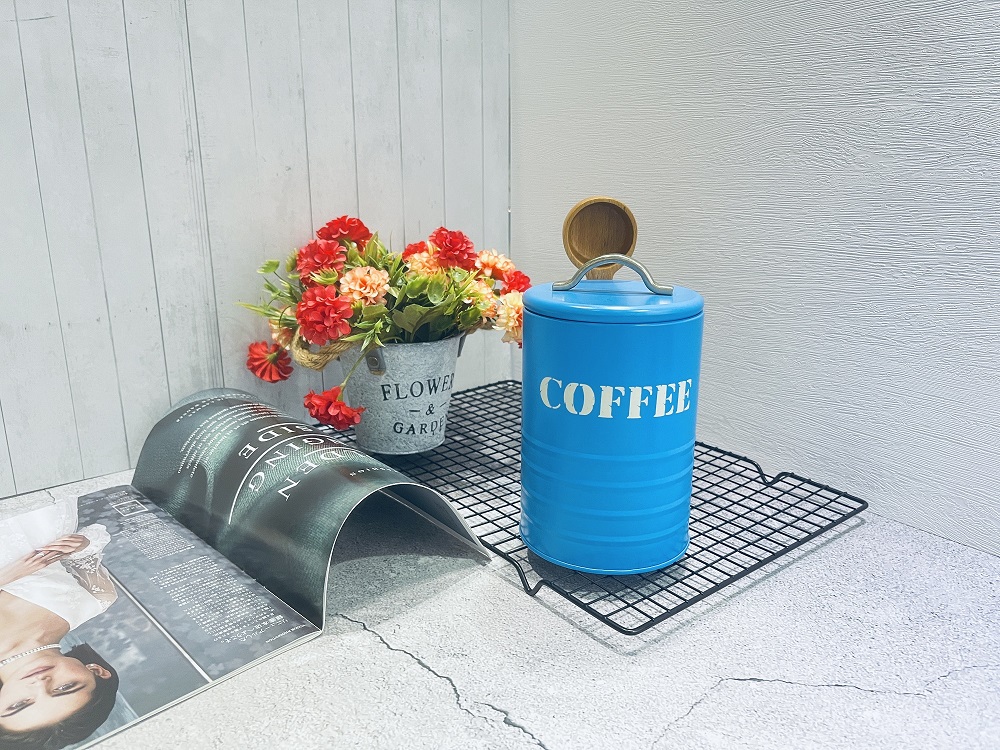 Coffee canisters with wooden spoon