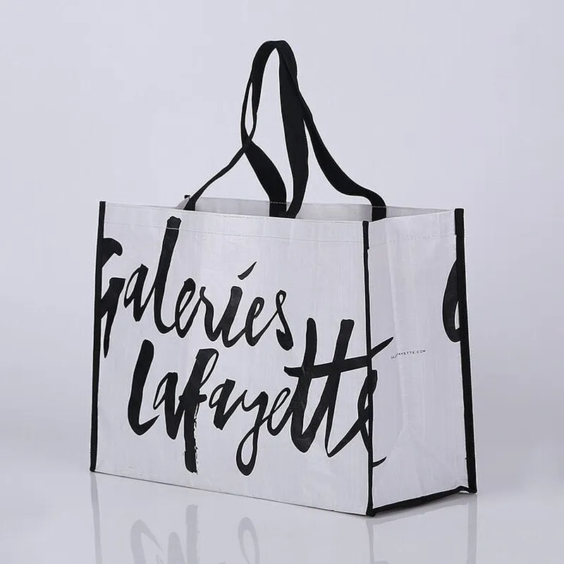 Custom white pp woven bag black logo shopping bag