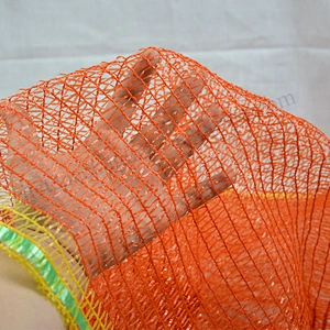 Drawstring orange raschel mesh bag for onions, potatoes, tomatoes, melons, oranges