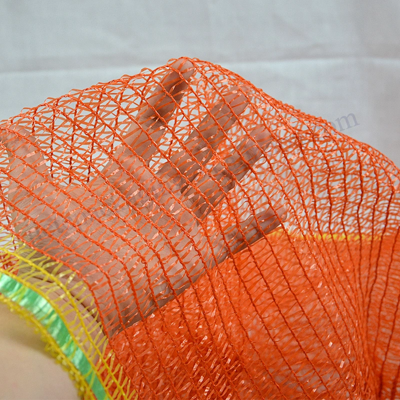 Drawstring orange raschel mesh bag for onions, potatoes, tomatoes, melons, oranges