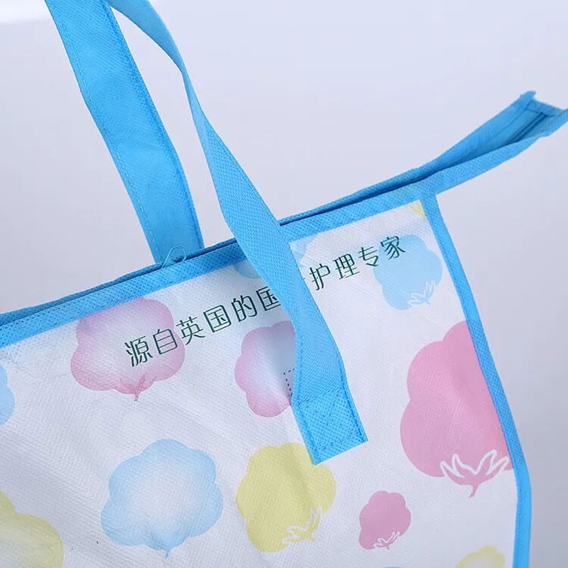 Custom white band handle non-woven bag for baby care package