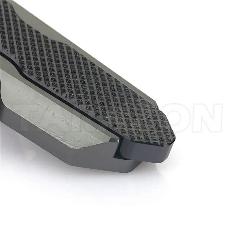Aftermarket knurled motorcycle passenger foot pegs