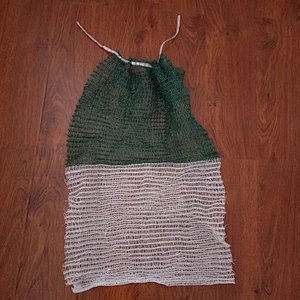 Mesh drawstring bag packaging onion,cabbage,potato,orange