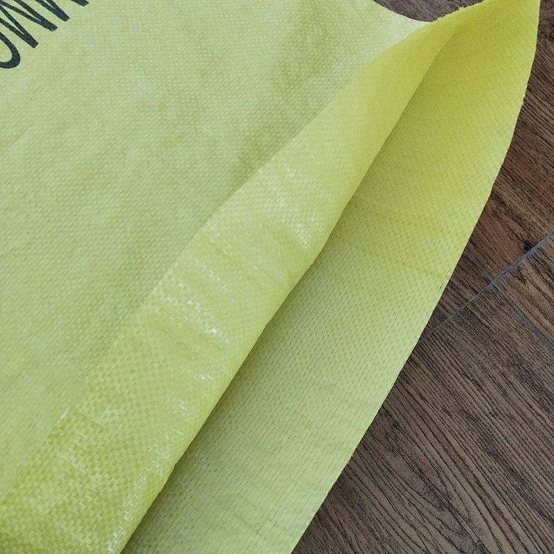 Custom wholesale bopp laminated yellow bag for industrial use 50kg