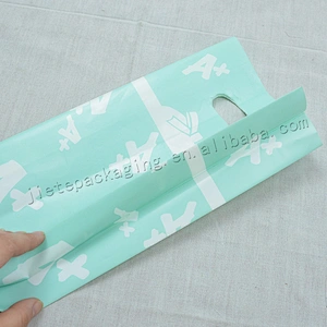 China supplier PE plastic gift packing bag with handle for Christmas