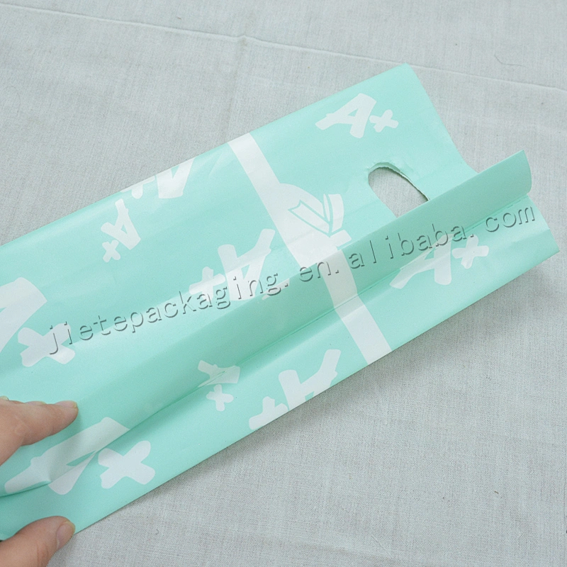 China supplier PE plastic gift packing bag with handle for Christmas