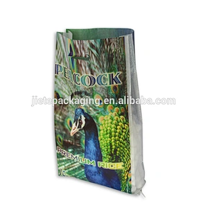 *Customized bopp and laminated 100% new material pp woven fabric plastic transparent 10kg rice packing bag with punching handle