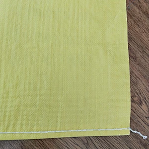Custom wholesale bopp laminated yellow bag for industrial use 50kg
