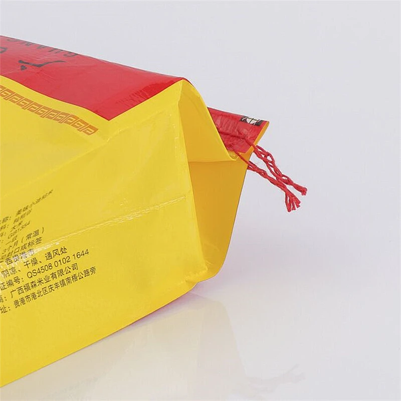 Custom wholesale yellow woven bag 15 kg for rice, feed woven bag