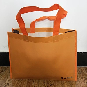 Custom wholesale orange non-woven bags for shopping