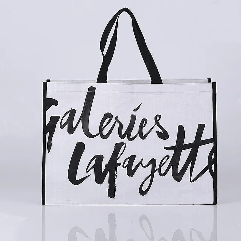 Custom white pp woven bag black logo shopping bag