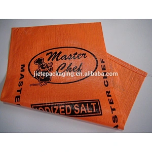 Cheap and durable flexo printing yellow plastic pp woven salt packing bag for sugar,iodate,feed salt,fertilizer