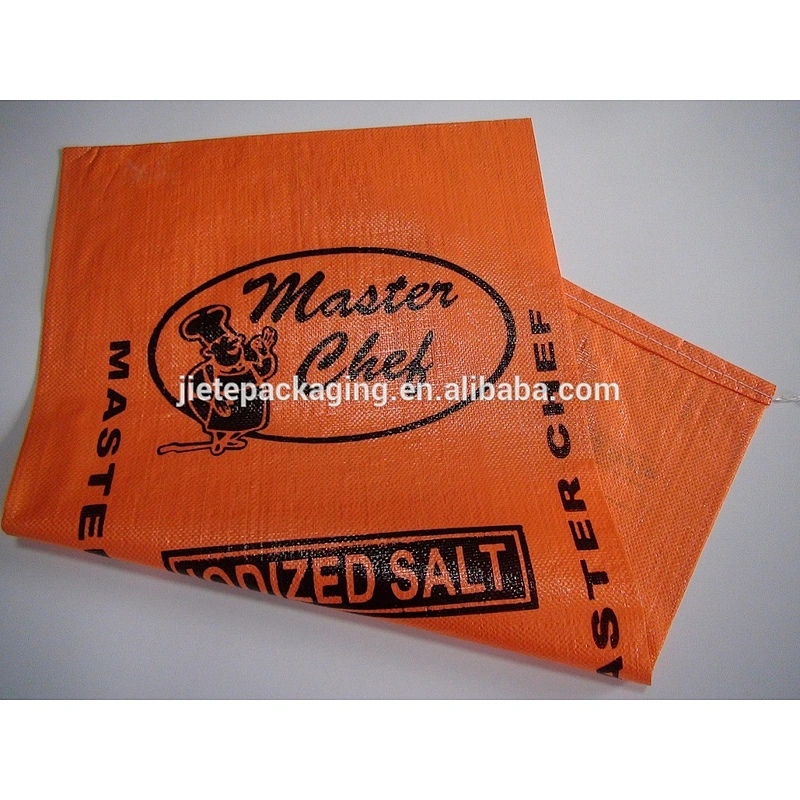 Cheap and durable flexo printing yellow plastic pp woven salt packing bag for sugar,iodate,feed salt,fertilizer
