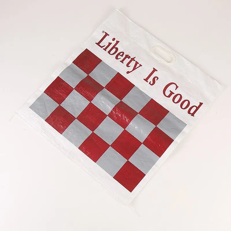 Non-woven tape handle garment bag