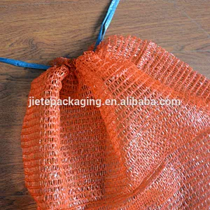 Drawstring orange raschel mesh bag for onions, potatoes, tomatoes, melons, oranges