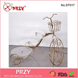 bike shape golden plated wedding cake stand