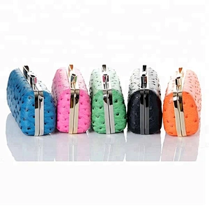 Finest hard shell clutch with bow closure Ostrich grain material evening clutches for woman