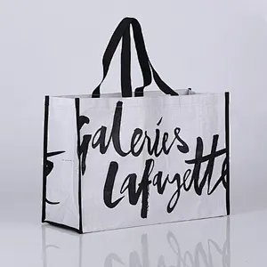Custom white pp woven bag black logo shopping bag