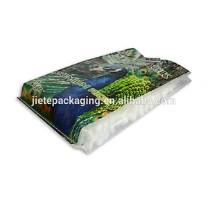 *Customized bopp and laminated 100% new material pp woven fabric plastic transparent 10kg rice packing bag with punching handle