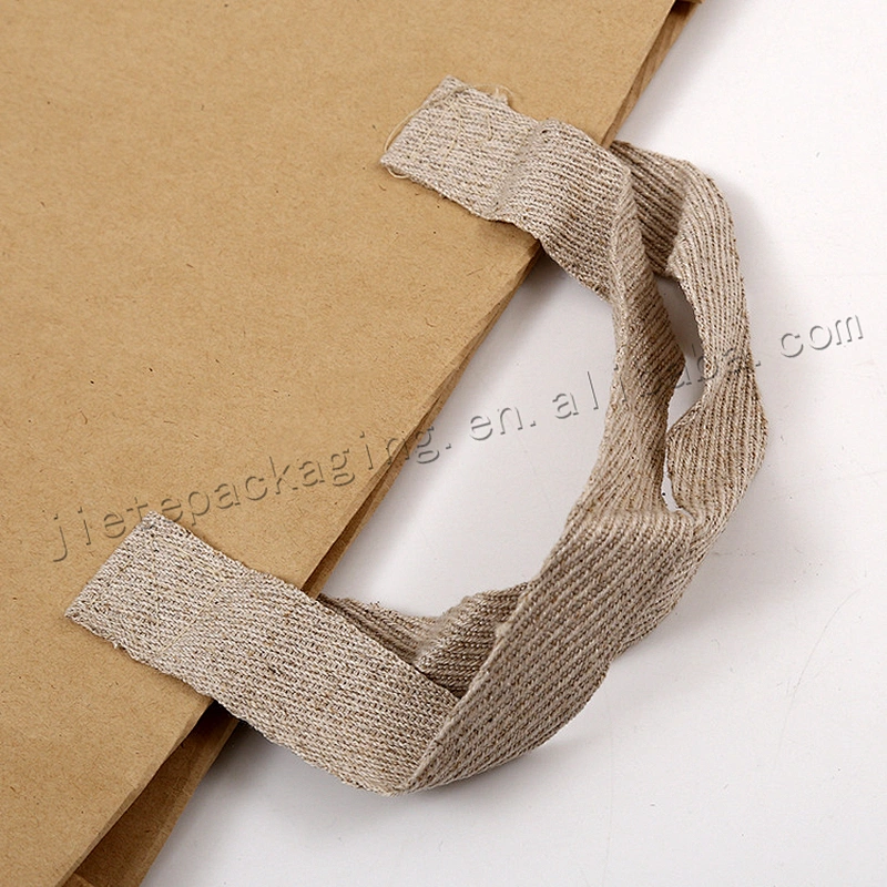 Customized fashion folding kraft paper shopping bag,shopping bag with handle and pp woven lining