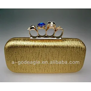 Gold Metal Knuckle Duster Clutch Four crossbones heads closure skull Cocktail Evening Bag