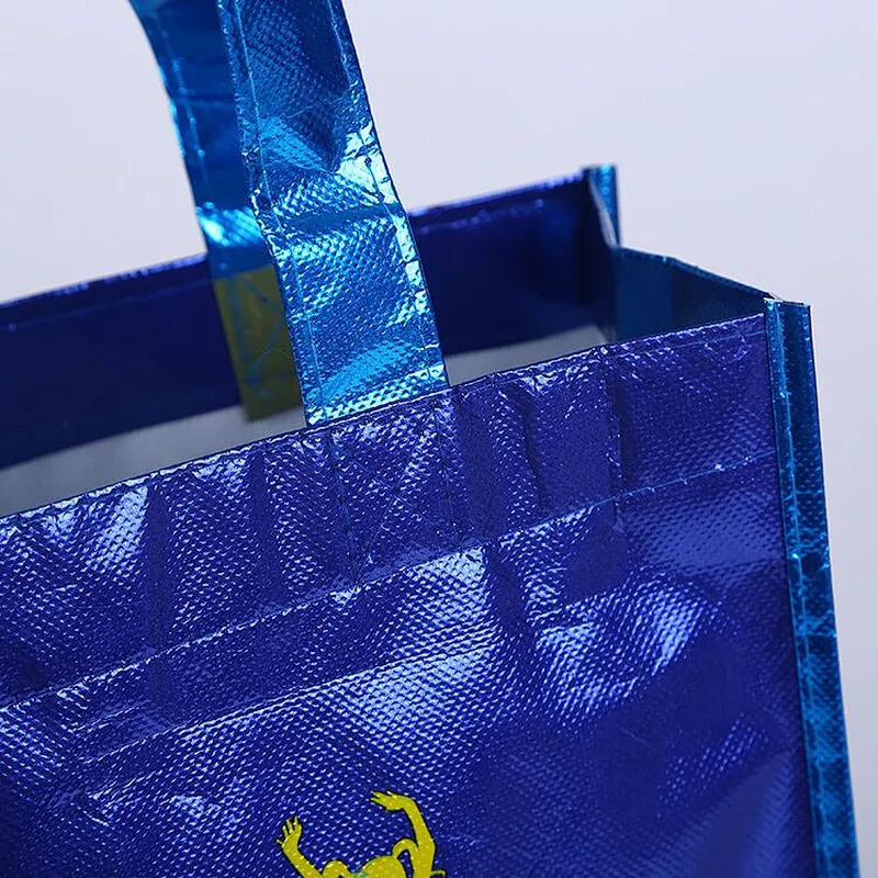 Blue non-woven shopping bags are used in supermarkets
