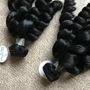 The highest quality natural black and natural brown color loose wave virgin hair Indian human hair weave