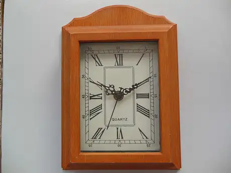 shaped wall clock