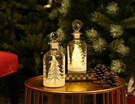 LED glass bottle with xmas tree deco