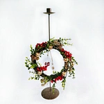 Metal candle holder with wreath decoration