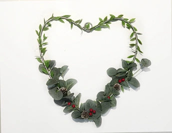 Metal candle holder with Xmas wreath