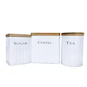 white canisters with wood lids
