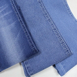 Wholesale stock lot woven blue stretch denim fabric for jacket