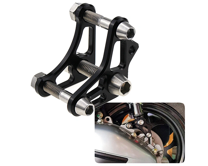 Motorcycle shock absorber adjuster