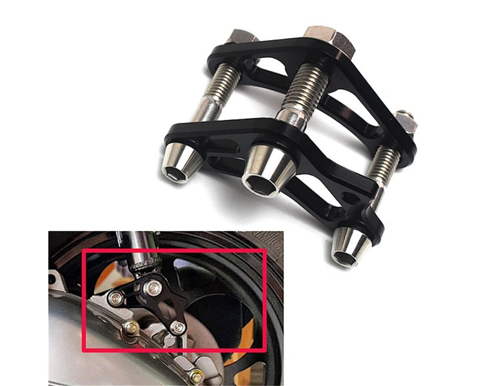 Motorcycle shock absorber adjuster